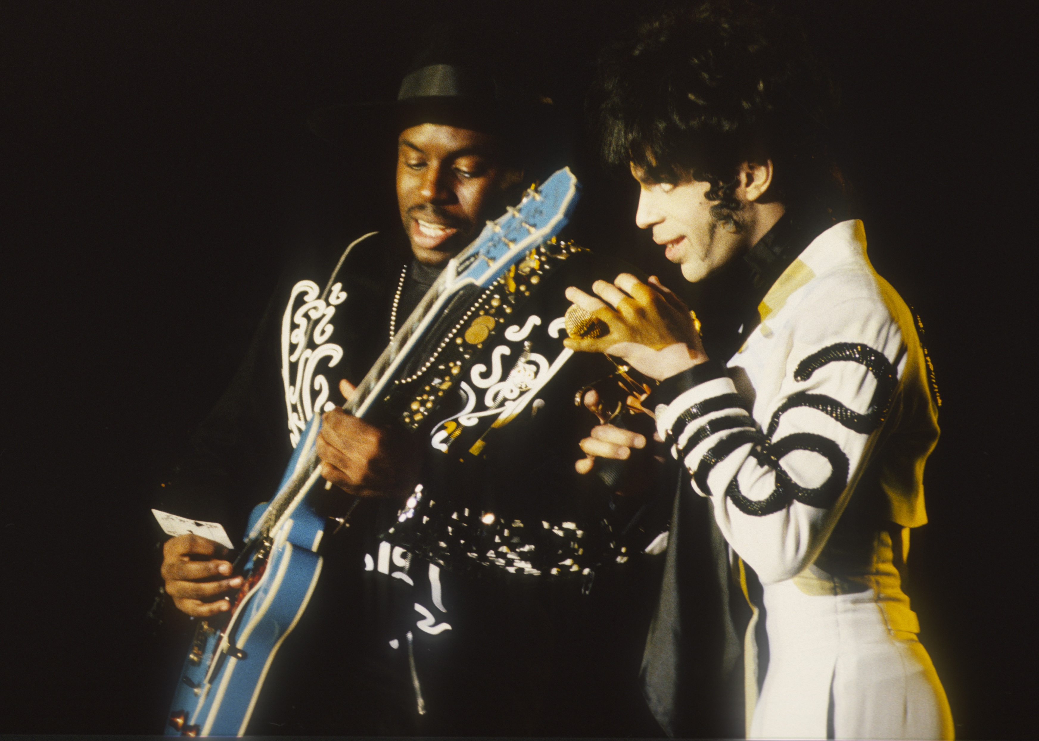 Levi Seacer Jr. (left) and Prince perform onstage at the Flanders Expo in Ghent, Belgium on April 9, 1993