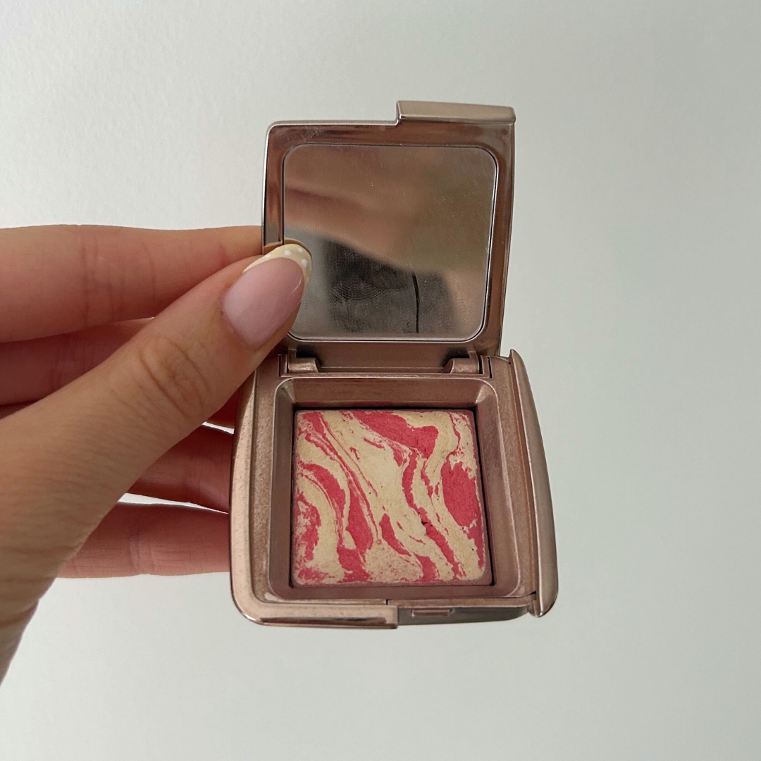 Hand holding Hourglass Ambient&amp;trade; Lighting Blush