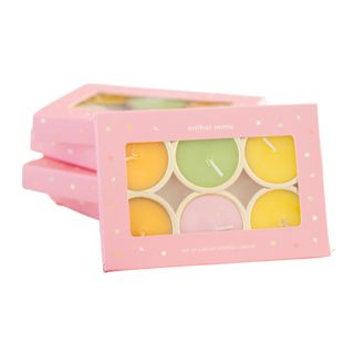 A mini set of mithai (Indian sweets) scented candles in pastel tones