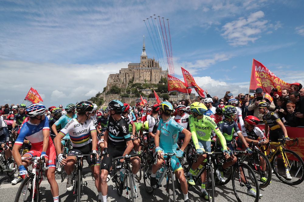 A flyover sends the peloton off for stage 1 at Mont-St-Michel