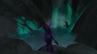 WoW Crystal-encased chest - a shadow priest is looking at the crystal-encased chest in the zaralek cavern