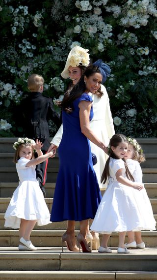Princess Charlotte of Cambridge, Prince George of Cambridge, Catherine, Duchess of Cambridge, Jessica Mulroney, Ivy Mulroney and Florence van Cutsem after the wedding of Prince Harry and Ms. Meghan Markle at St George's Chapel at Windsor Castle on May 19, 2018 in Windsor, England