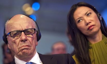 Wendi Murdoch, wife of Rupert, in Paris in May: On Tuesday, she foiled a protester who tried to give the embattled media mogul a face full of shaving cream.
