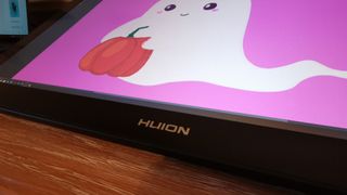 A close up of the Huion Kamvas 24 Pro 4K logo