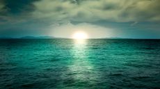 a photo of the ocean with a green tint