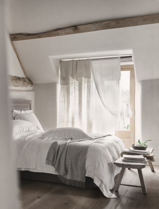 Sheer curtains in a White Company bedroom
