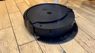 iRobot Roomba Combo 10 Max mopping a wooden floor