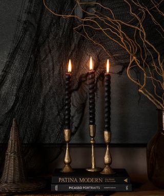 Black tapered candles