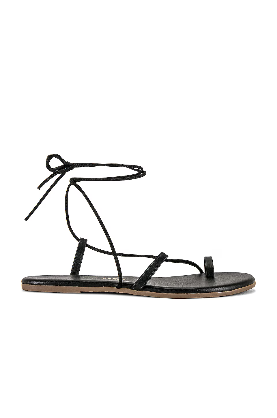 A pair of black gladiator sandals from TKEES at Revolve.