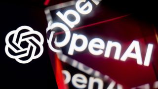 OpenAI logos are being displayed and reflected on screens.