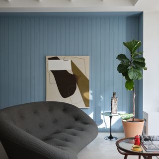Farrow & Ball paint colour Kittiwake on panelled walls in seating area in home