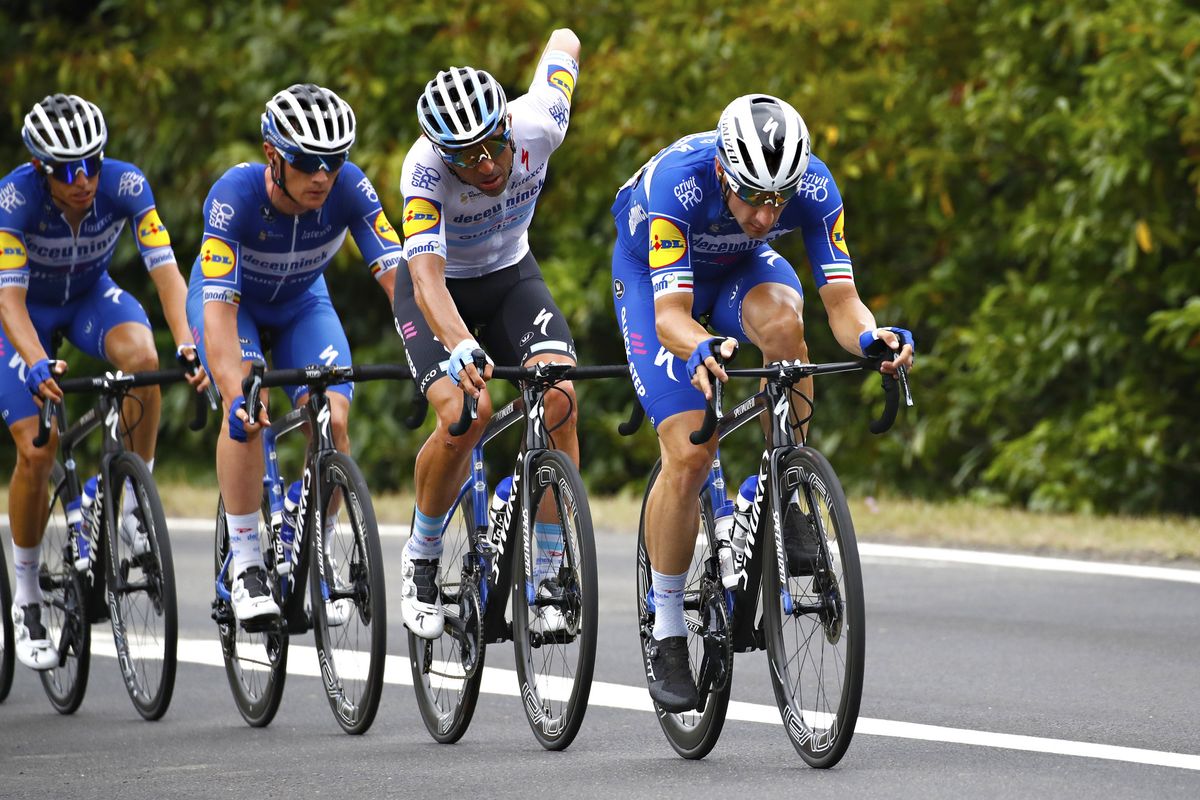 Elia Viviani takes up domestique work, driving the peloton on stage 12