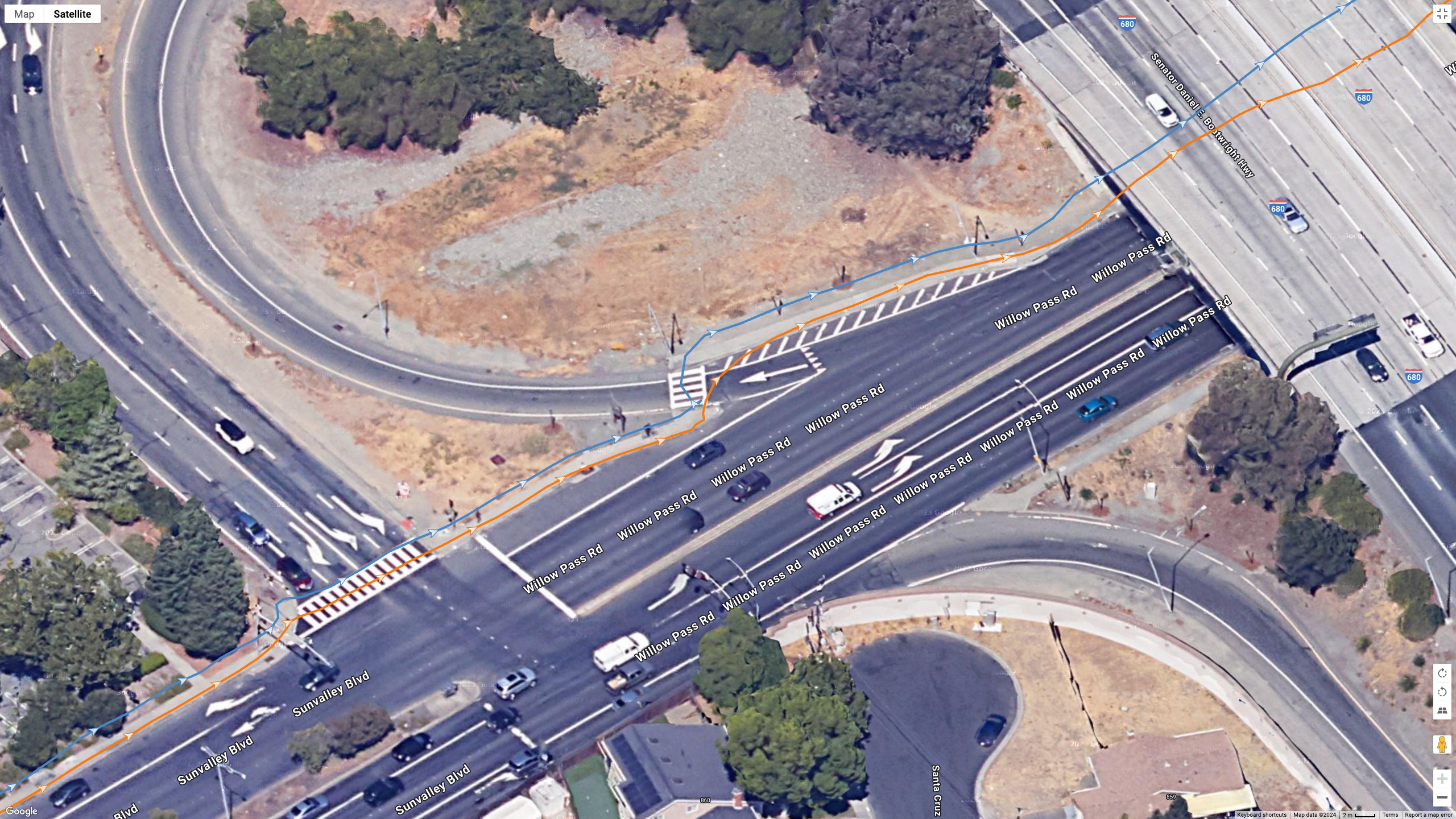 A Google Maps satellite view showing how the Polar Vantage M3 (orange line) and Garmin Fenix 8 (blue line) compared for GPS accuracy during a run.