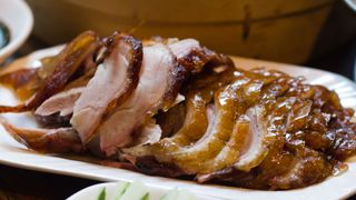 Pekin duck sitting on dish