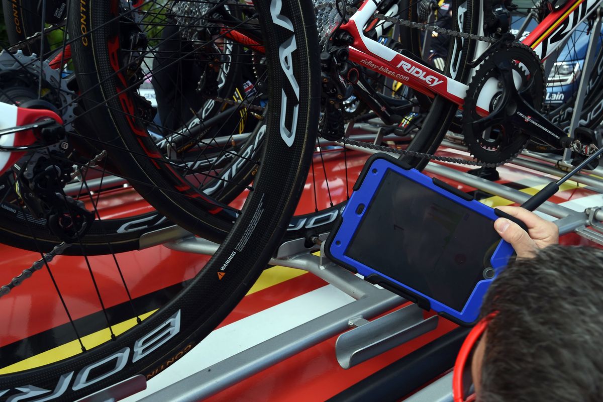 The UCI uses its magnetic resonance tablet to check for motors at the Tour de France