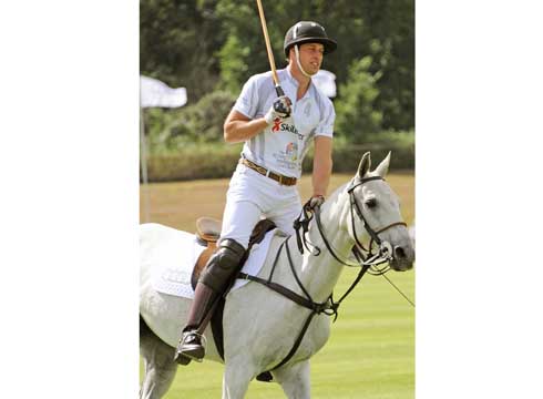 Action shot: Prince William returns to the polo pitch