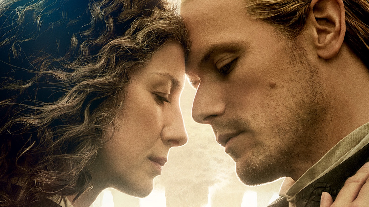 caitriona balfe and sam heughan embrace in a promotional image for outlander season 8