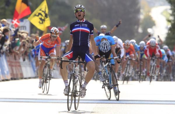 Pierre-Henri Lecuisinier celebrates ans the other riders fight for the placings