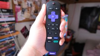 The Roku Voice Remote Pro in hand
