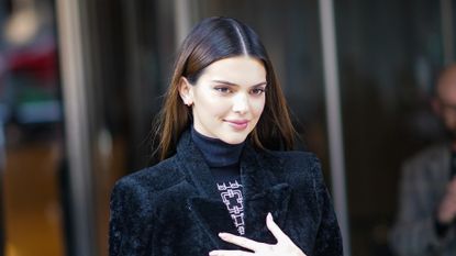 NEW YORK, NEW YORK - FEBRUARY 08: Kendall Jenner wears a turtleneck pullover, a black fluffy long coat, outside Longchamp, during New York Fashion Week Fall-Winter 2020, on February 08, 2020 in New York City. (Photo by Edward Berthelot/Getty Images)