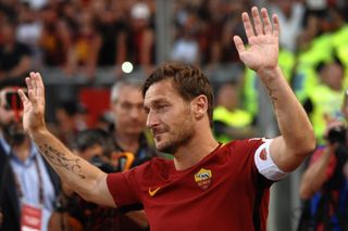 Francesco Totti says goodbye to the Roma fans following his final appearance for the club in May 2017.