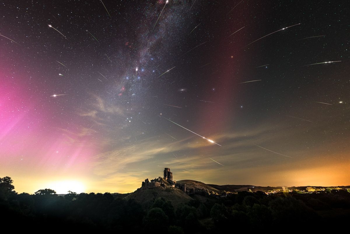 “Unique” photo: Perseid meteors, northern lights and rare glowing arch shine over an 11th century castle