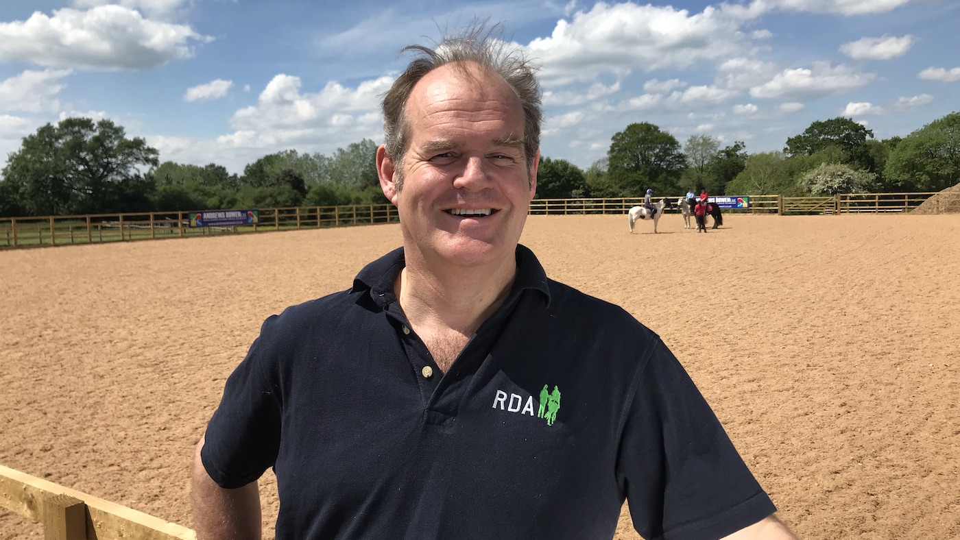 Former RDA chief executive Ed Bracher standing in front of an outdoor riding arena