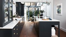 modern kitchen with island and white worktops