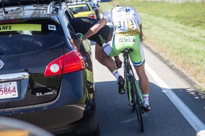 Peter Sagan (Cannondale) has his bike fixed during the stage.
