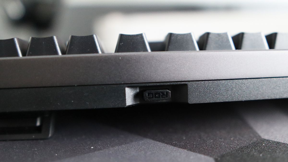 Asus ROG Strix Morph 96 Wireless on a desk mat.