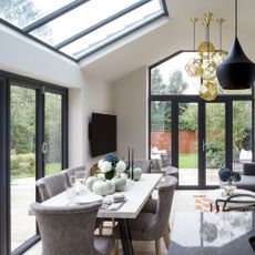 Extended kitchen diner with rooflights and patio doors to fill the space with light