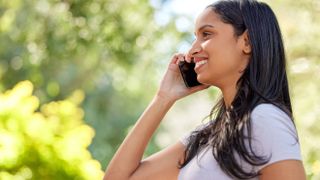 Woman talking on a phone.