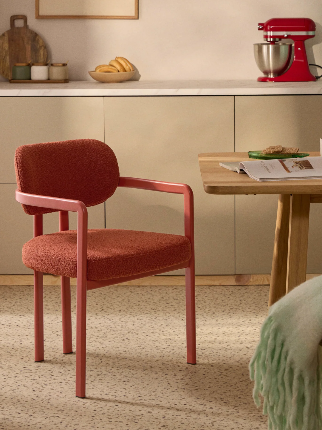 A coral boucl&amp;eacute; dining chair from Westwing