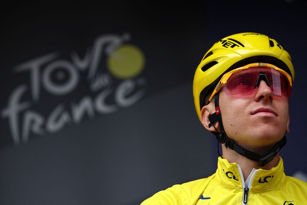 UAE Team Emirates team's Slovenian rider Tadej Pogacar wearing the overall leader's yellow jersey awaits the start of the 8th stage of the 111th edition of the Tour de France cycling race, 183,5 km between Semur-en-Auxois and Colombey-les-deux-Eglises, on July 6, 2024. (Photo by Anne-Christine POUJOULAT / AFP)