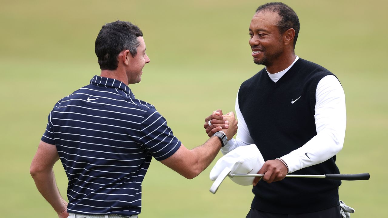 Rory McIlroy and Tiger Woods shake hands