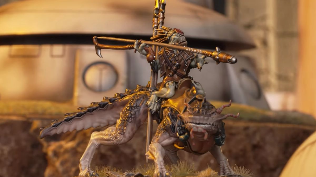 A Kroot alien rides an axolotl dinosaur in Warhammer 40K