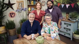 The judges and hosts of The Great American Baking Show