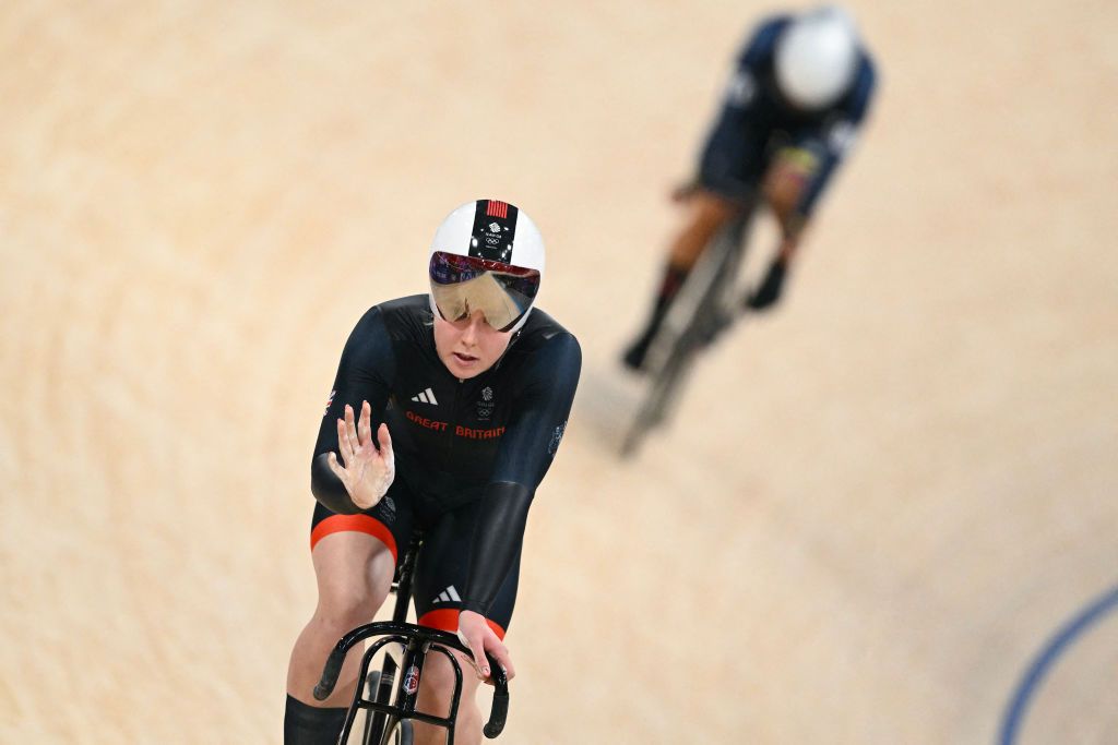 Britain's Emma Finucane reacts after a women's track cycling sprint quarter-final race 2 of the Paris 2024 Olympic Games at the Saint-Quentin-en-Yvelines National Velodrome in Montigny-le-Bretonneux, south-west of Paris, on August 10, 2024. (Photo by SEBASTIEN BOZON / AFP)