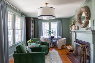 Green living room painted in Farrow & Ball Card Room Green by Camden Grace Interiors