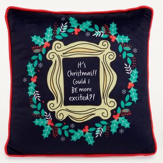 Blue Christmas cushion with green and red embroidery
