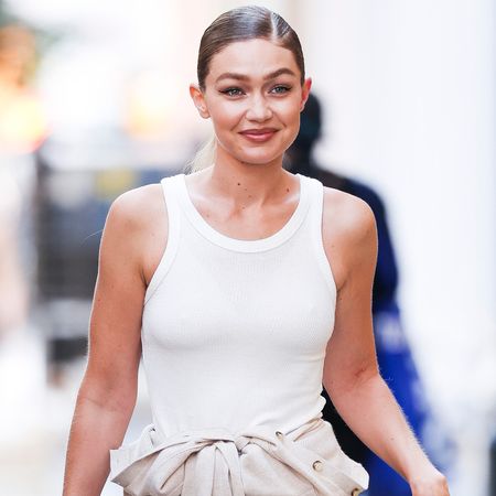 Gigi Hadid was spotted in NYC wearing fall's brown sneaker trend in suede