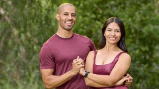 Jonathan and Ana Towns hold hands during their Amazing Race Season 37 promo. 
