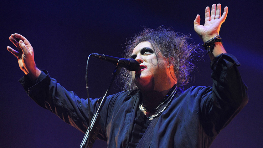 Robert Smith of The Cure performs live on stage at Wembley Arena on December 1, 2016 in London, England.