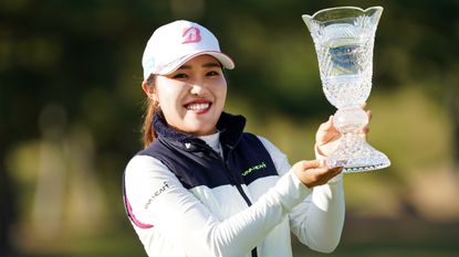 Ayaka Furue with the trophy after winning the 2021 Toto Japan Classic