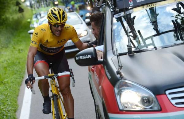 Fabian Cancellara (RadioShack-Nissan) consults with the team car.