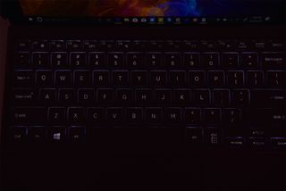 Backlit keys of the Galaxy Book2 when dark.