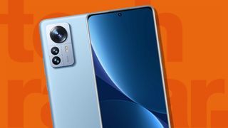 Bästa Xiaomi-mobiler: En bild på en ljusblå Xiaomi-mobil som visas upp både fram- och bakifrån, mot en orange bakgrund med texten "TechRadar" skriven i stort