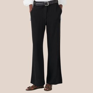 flat lay image of woman wearing black trousers