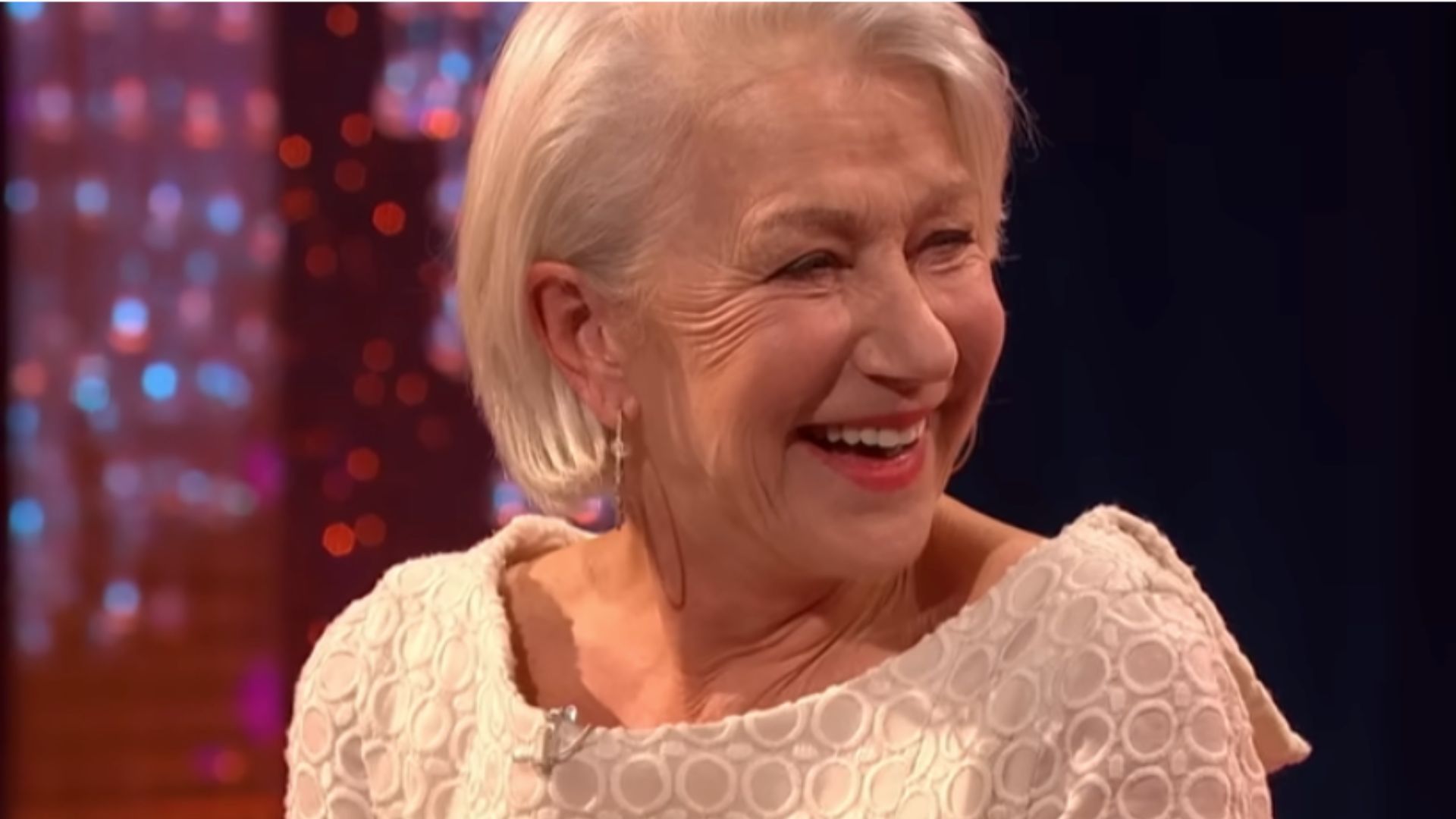 a headshot of helen mirren while on the graham norton show 