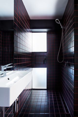 A bathroom with grout in color